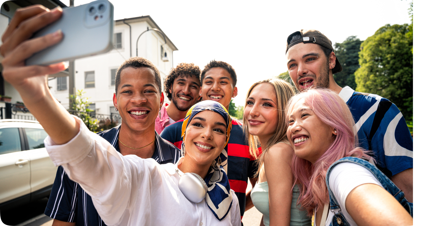Young community taking a selfie together